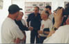 M. Maillard-Brune,  gauche sur la photo, un verre de rouge  la main (il faisait trs chaud dimanche !) explique  Jean-Paul Cavelier notre Trsorier et aux autres personnes intresses quelques unes des innombrables anecdotes sur Monthlry et ses courses, 76 ko